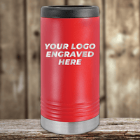 A red insulated Kodiak Coolers tumbler with a black lid, silver base, and your custom company logo engraved on the front—Realtor Closing Gifts for Clients—sits on a wooden surface with a blurred wood background.