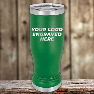 Green stainless steel Custom Pilsner Tumblers 14 oz with your Logo or Design Engraved by Kodiak Coolers displayed on a wooden surface.
