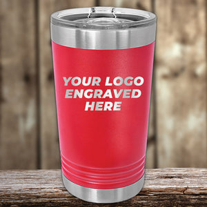 The Kodiak Coolers custom engraved drinkware tumbler in red, featuring a clear lid and "Your Logo Engraved Here" in bold white, is available at wholesale pricing with no setup fee and includes a one-side logo. A $250 minimum order is required for the Presidents Day sale.