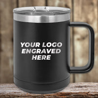 The Kodiak Coolers Custom Coffee Mug 15 oz, engraved with your logo or design, is perfect for branding. Shown in black with a clear lid on wood. Special Black Friday sale with volume pricing—LIMITED TIME!.