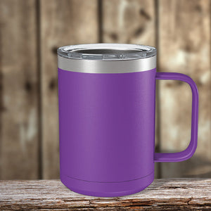 A purple Custom Coffee Mug 15 oz with your Logo or Design engraved from Kodiak Coolers, placed on a wooden table.