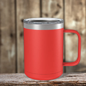 A red Custom Coffee Mug 15 oz with your Logo or Design Engraved - Special New Years Sale Bulk Pricing - LIMITED TIME by Kodiak Coolers, sits on a wooden table.