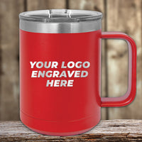 A red Kodiak Coolers mug from the Engraved Custom Logo Drinkware line, featuring single side engraving and a clear lid, sits on a wooden surface with "YOUR LOGO ENGRAVED HERE" printed on the front.