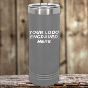 A customizable Kodiak Coolers 22 oz Custom Skinny Tumbler with your Logo or Design Engraved - Low 6 Piece Order Minimal Sample Volume displayed on a wooden surface.
