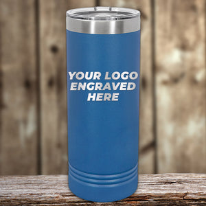 Blue Kodiak Coolers Custom Skinny Tumblers 22 oz with "your logo engraved here" text, displayed on a wooden surface.