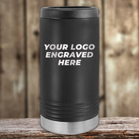 A black and silver Kodiak Coolers thermos tumbler, ready for your custom logo engraving, stands on a wooden surface. Ideal for those looking for personalized drinkware, with no setup fee and unbeatable wholesale pricing during our Presidents Day Sale. Minimum order: $250.