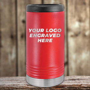 A red insulated tumbler with a black lid and silver base, from Kodiak Coolers, sits on a wooden surface. It features "Your Logo Engraved Here" in white. Perfect for custom orders, this Presidents Day sale includes 1 side logo with no setup fee and a $250 minimum order.