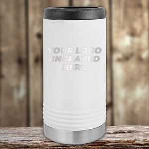 A Custom Slim Seltzer Can Holder with your Logo or Design Engraved by Kodiak Coolers, displayed on a wooden surface with a blurred background.