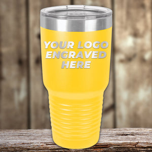 A yellow Custom Tumblers 30 oz with your Logo or Design Engraved - Special Bulk Wholesale Volume Pricing by Kodiak Coolers, perfect for keeping beverages hot or cold on the go.