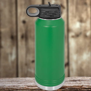 Kodiak Coolers Custom Water Bottles 32 oz with your Logo or Design Engraved - Special New Years Sale Bulk Pricing - LIMITED TIME, with a black flip-top lid, standing on a wooden surface with a blurred wooden background.