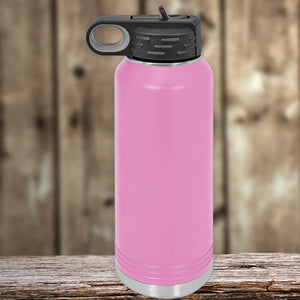 Pink Custom Water Bottles 32 oz with your Logo or Design Engraved - Special New Years Sale Bulk Pricing - LIMITED TIME stainless steel water bottle with a black flip-top lid, resting on a wooden surface against a blurred wooden background. By Kodiak Coolers.