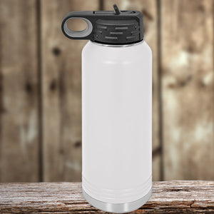 White insulated stainless steel water bottle with a black flip-top lid, placed on a wooden surface against a blurred wooden background. Custom Water Bottles 32 oz with your Logo or Design Engraved - Special New Years Sale Bulk Pricing - LIMITED TIME by Kodiak Coolers.