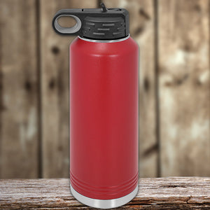 Kodiak Coolers Custom Water Bottles 40 oz with your Logo or Design Engraved - Special New Years Sale Bulk Pricing - LIMITED TIME on a wooden surface.