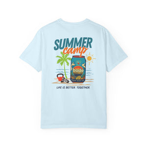 The BODE Summer Camp T-Shirt 2026 by Printify is a light blue heavyweight unisex comfort shirt with “Summer camp,” beach graphic, palm trees, sun, a bode can, and “Life’s Better Together” on the back.