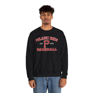 A person models the Printify P Reds Baseball Est. 1978 - Unisex Heavy Blend™ Crewneck Sweatshirt, featuring "Pulaski Reds Baseball Est. 1978" in red and white text, against a plain white background.