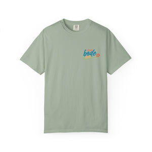 The BODE Summer Camp T-Shirt 2026 by Printify features a light green Comfort Colors 1717 tee with a small, colorful "Life's Better Together" graphic and flower on the left chest, made from heavyweight cotton for comfort and lasting style.