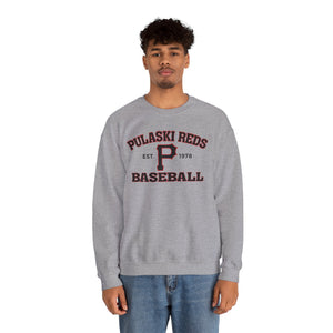 A person stands facing forward wearing the Printify P Reds Baseball Est. 1978 Unisex Heavy Blend™ Crewneck Sweatshirt, a gray cotton blend with "P Reds Baseball Est. 1978" in red and black printed on the front.
