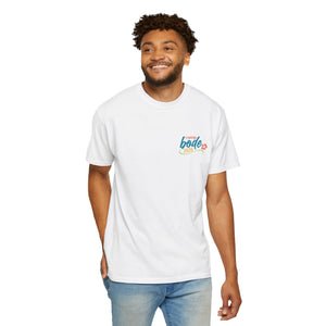 Smiling man in a Printify Summer Camp T-Shirt — 'Life Is Better Together' Beach Can Design and jeans stands against a plain white background.