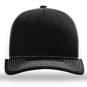 A Richardson black and white trucker hat with a mesh back on a white background.