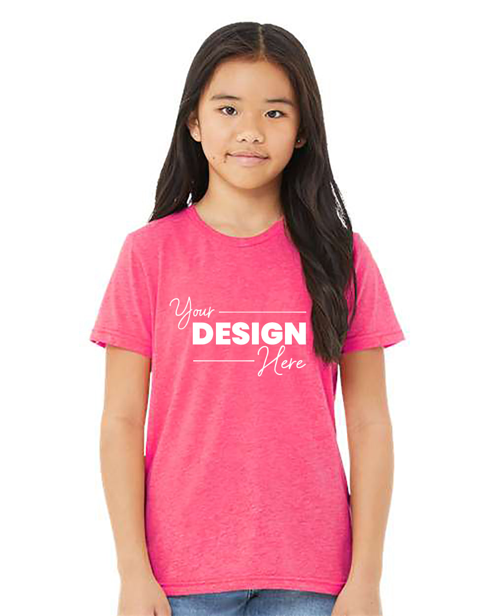 A young girl with long hair wears a high-quality, durable Bella Canvas Youth Triblend T-Shirt in pink from BELLA + CANVAS, featuring the text "Your Design Here" printed on the front. The background is plain white.
