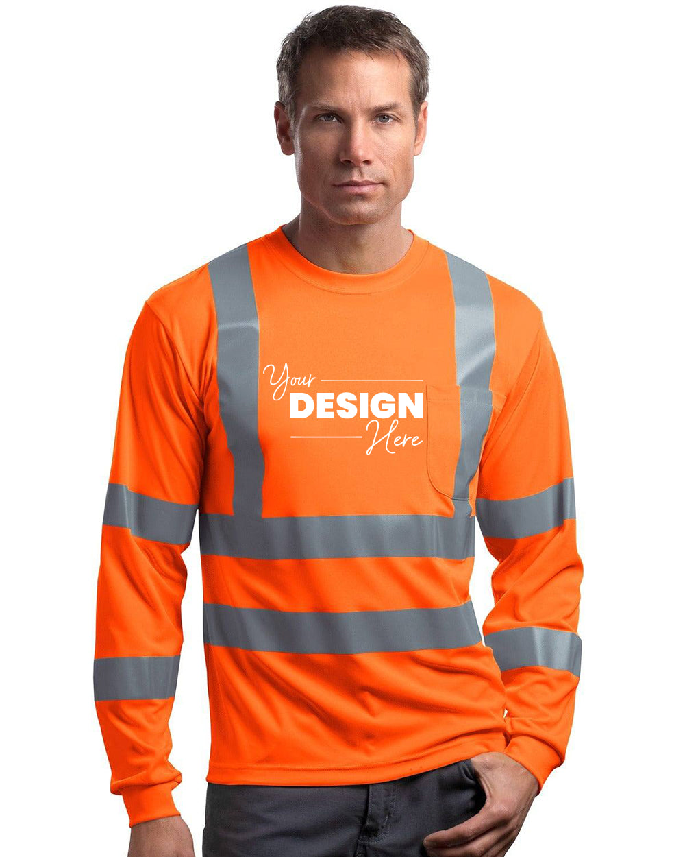 A person wears a CornerStone ANSI 107 Class 3 Orange Long Sleeve Snag-Resistant Reflective T-Shirt CS409, featuring "Your Design Here" in bold text and adorned with reflective strips.