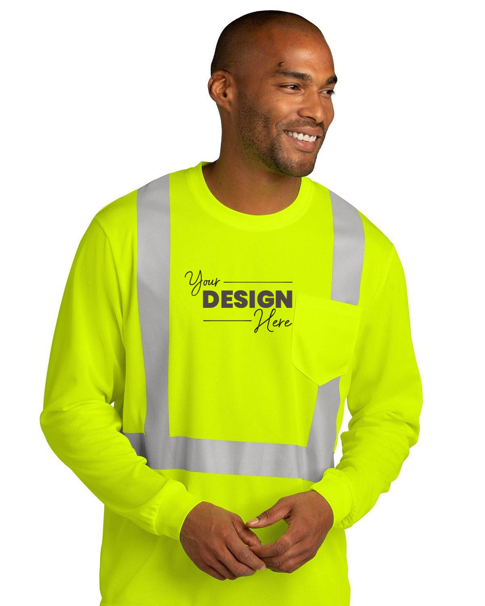 A man wears the CornerStone ANSI 107 Class 2 Mesh Long Sleeve T-Shirt CS201 in neon yellow with breathable mesh, reflective stripes, a front pocket, and "Your Design Here" text—ideal for enhanced visibility and safety.