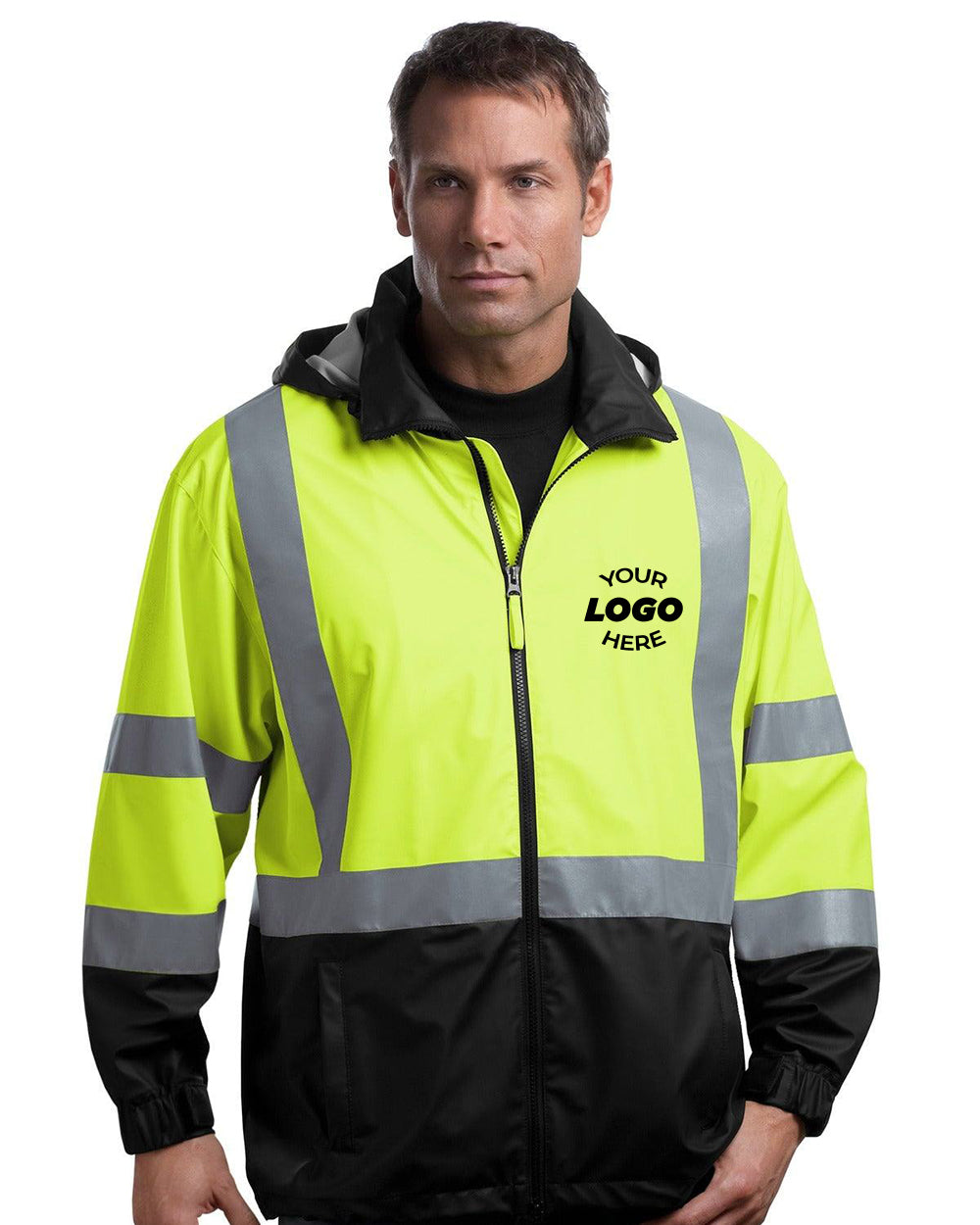 A man stands against a plain backdrop, wearing a yellow and black high-visibility CornerStone ANSI 107 Class 3 Safety Windbreaker CSJ25 with reflective taping and "Your Logo Here" printed on the front.