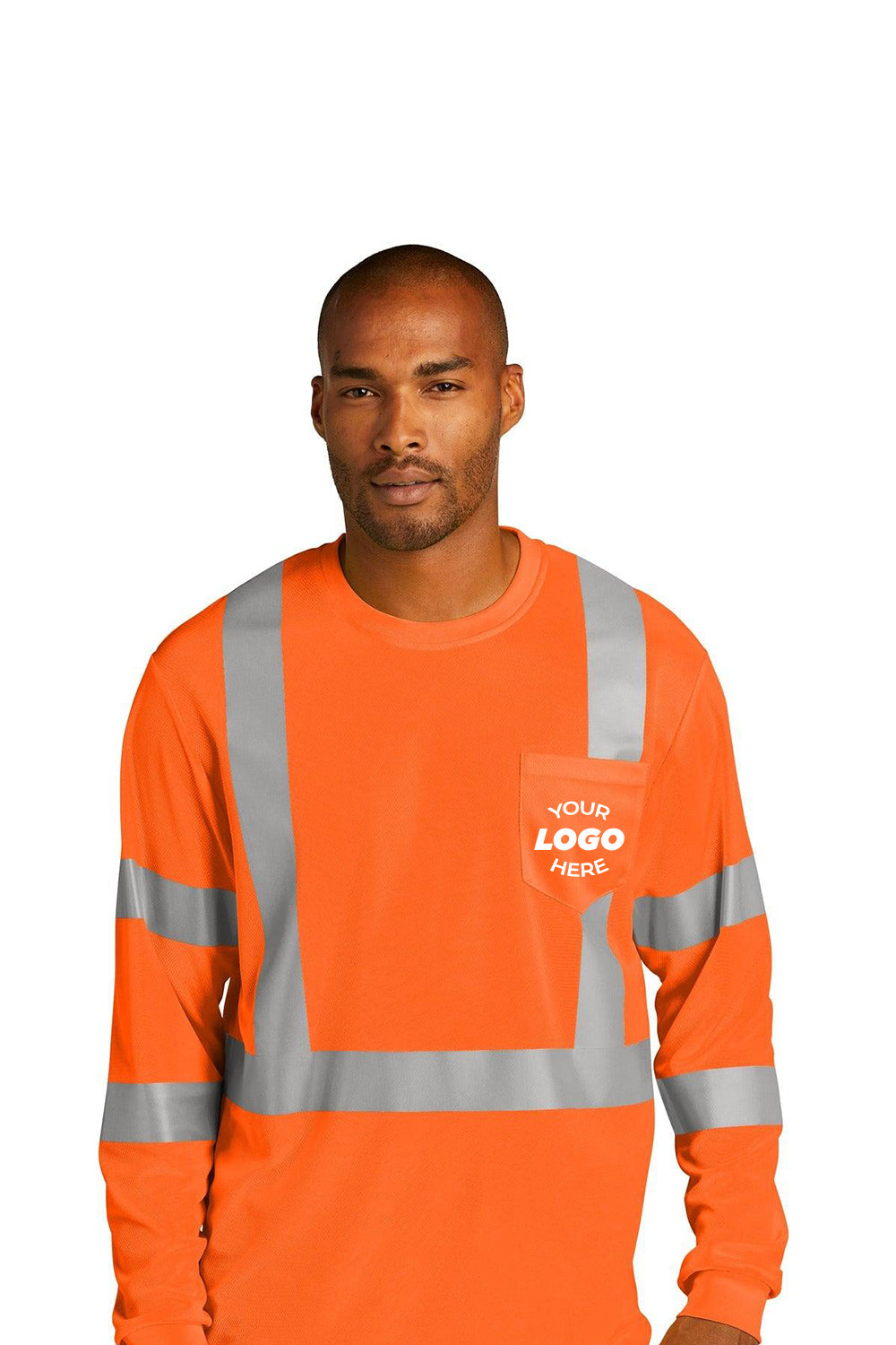 A man wearing a CornerStone ANSI 107 Class 3 Mesh Long Sleeve T-Shirt CS203 in high-visibility orange with reflective silver stripes and a "Your Logo Here" pocket stands against a white background.