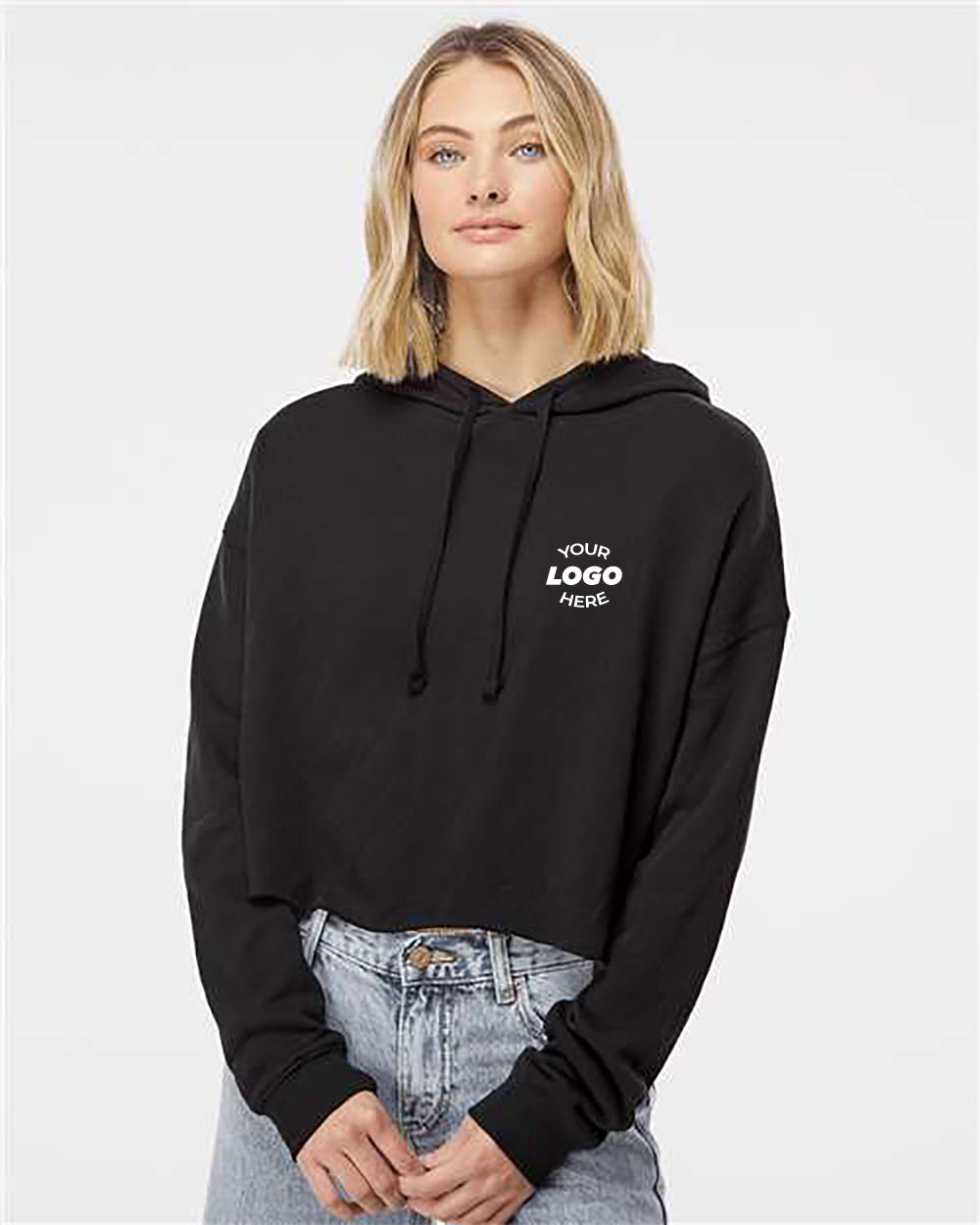 A person wearing an Independent Trading Co. Women's Lightweight Crop Hoodie Sweatshirt, featuring a custom 