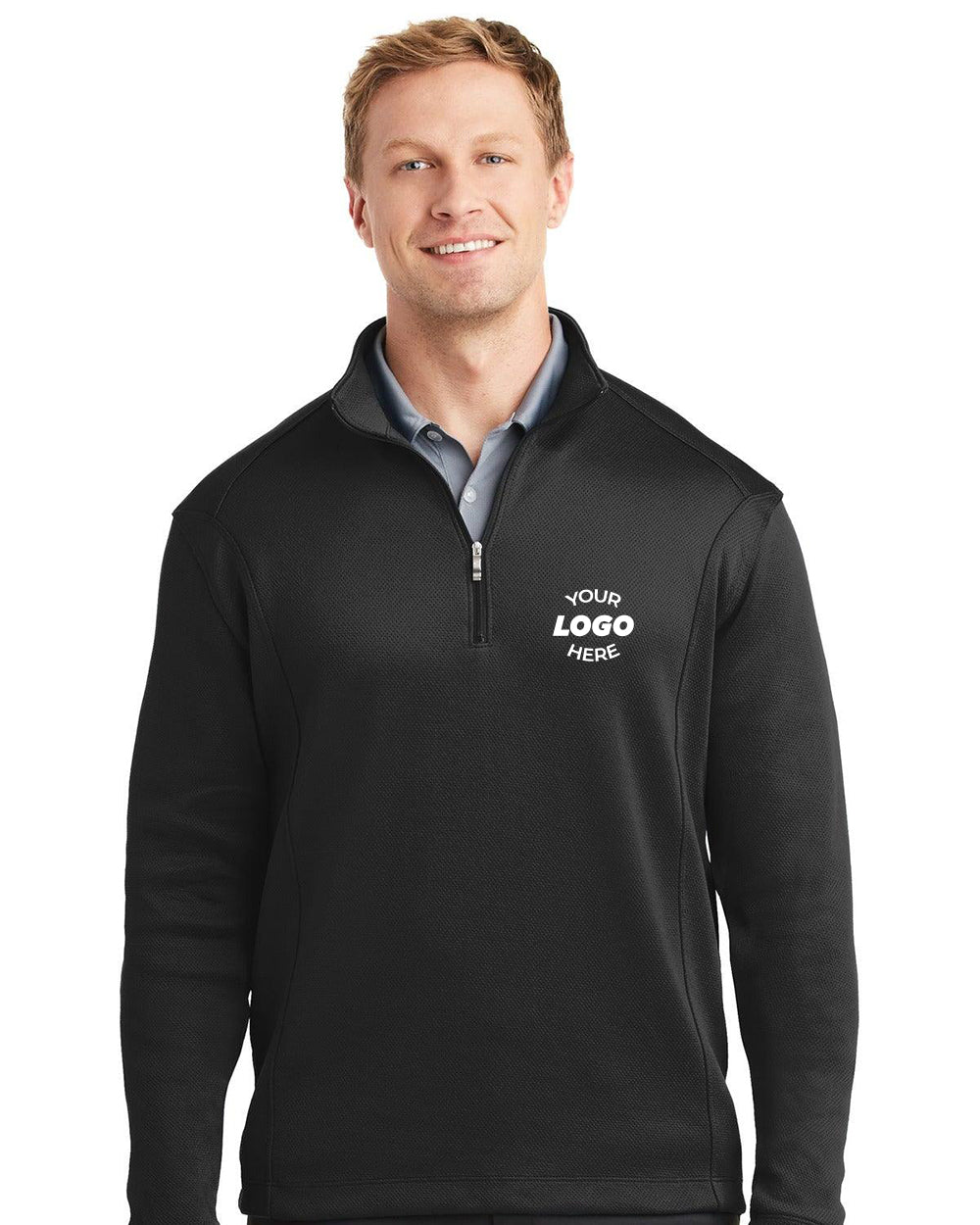 A man confidently wears a black Nike Sport Cover-Up 1/4 Zip Pullover Sweatshirt 400099, featuring "<YOUR LOGO HERE>" embroidered on the left chest.