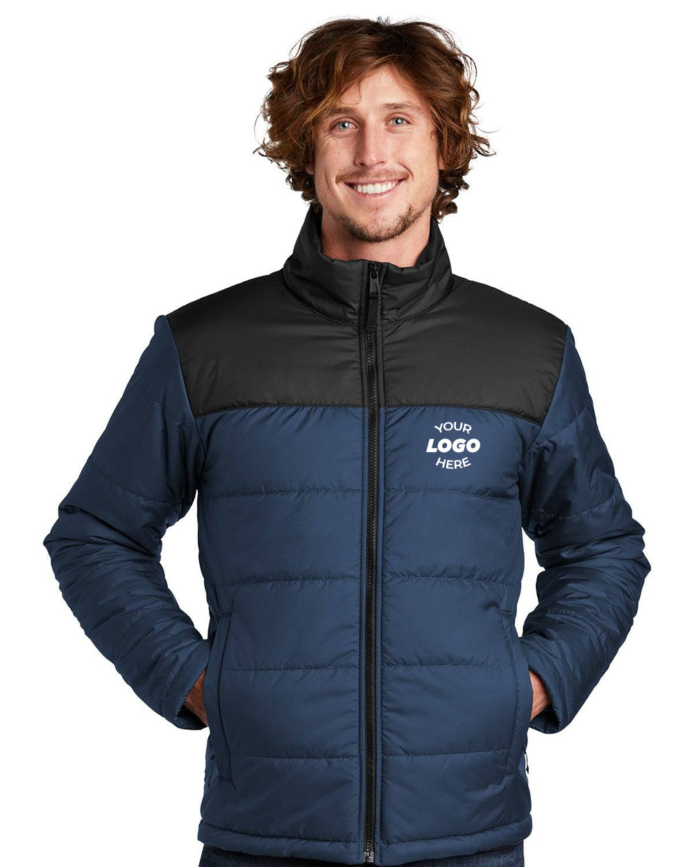 A person wears The North Face Everyday Insulated Jacket NF0A529K in blue and black, showcasing the iconic logo. With Heatseeker insulation, this jacket ensures warmth and comfort.