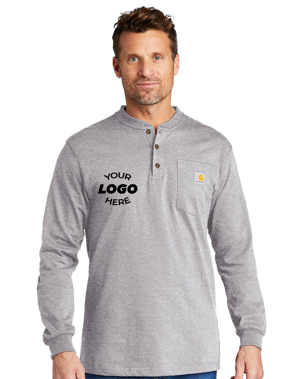 Man wearing a gray Carhartt Long Sleeve Henley Pocket T-Shirt CTK128, made from heavyweight cotton jersey with a chest pocket and "YOUR LOGO HERE" on the left—ideal for those who need durable Carhartt workwear.