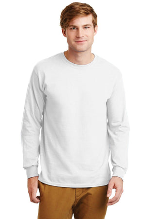 A man wearing a Gildan 100% US Cotton Long Sleeve T-Shirt 2400 with a custom screen printed logo and tan pants stands facing forward against a white background.