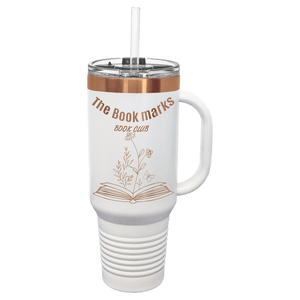 Introducing the NEW ION Plated Tumblers by Kodiak Coolers, featuring a custom engraved drinkware design with a special "Ghost Black & Rose Gold" engraving color. This stylish tumbler comes with a lid and straw and is adorned with a floral design and the text "The Book Marks Book Club," making it an ideal choice for logo promotional gifts or as a unique addition to your personalized collection.