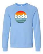The designerapp Bode Summer Bootcamp "OG Logo" unisex BC Fleece Raglan Sweatshirt 3901 features a retro logo in a sunset graphic on the chest, made from soft Airlume cotton and pre-shrunk for lasting comfort.