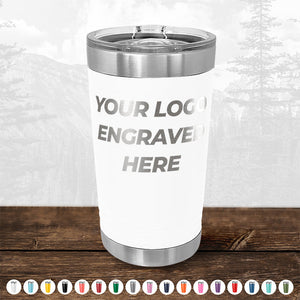 A double-walled insulated Kodiak Coolers Custom Pint Tumblers 16 oz with Slider Lid, customized with your logo or design, on a wooden surface.
