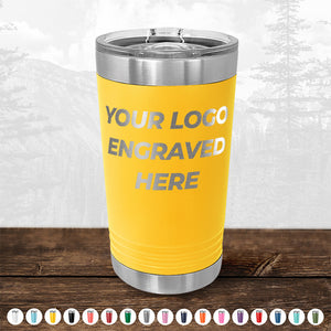 Custom Pint Tumblers 16 oz with Slider Lid by Kodiak Coolers with double-walled insulation and customizable engraving space displayed on a wooden surface.