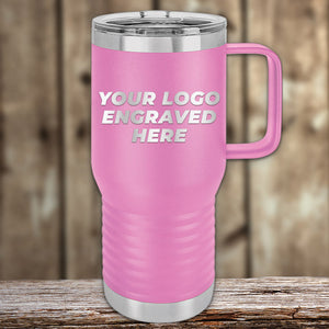 A pink Kodiak Coolers insulated travel mug with a handle and a laser-engraved customizable engraving area displayed on a wooden background.
