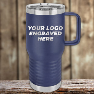 Blue Kodiak Coolers Custom Travel Tumblers 20 oz with your Logo or Design Engraved - Special Bulk Wholesale Pricing with a handle and customizable logo area displayed on a wooden surface.