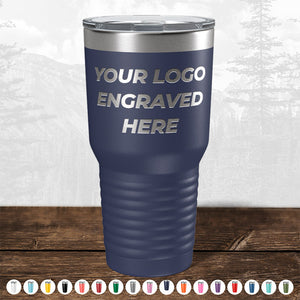 The PRIME BIG DAY DEALS custom drinkware by Kodiak Coolers features your logo laser-etched on a navy blue insulated tumbler with a clear lid. Multiple color options are available, shown along the bottom edge. No setup fees and fast turnaround!.