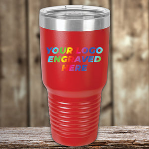 A Kodiak Coolers custom tumbler that says your logo engraved here and is UV printed on a red surface.