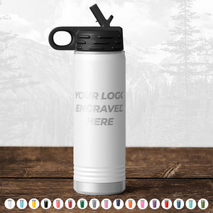 A Kodiak Coolers custom white water bottle with an engraved logo sitting on a wooden table.