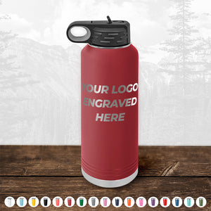 Red Kodiak Coolers custom water bottle with an option for custom engraving displayed on a wooden surface.