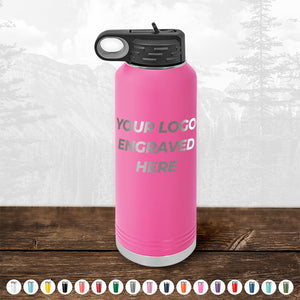 Pink Kodiak Coolers Custom Water Bottles 40 oz with your Logo or Design Engraved on a wooden surface.
