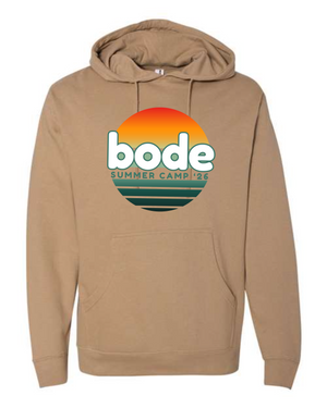 The 2026 Bode Summer Bootcamp OG Logo Hoodie Sweatshirt by Printify is a tan unisex fleece hoodie with a sunset graphic and "bode" and "Summer Camp '26" text, crafted in soft cotton-poly for comfort.