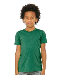 A young boy wearing a comfortable BELLA + CANVAS youth Triblend T-Shirt made of high-quality triblend material.