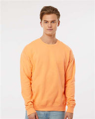 A man wearing a Tultex Unisex Fleece Crewneck Sweatshirt made of ringspun cotton/polyester.