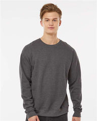 A man wearing a Tultex Unisex Fleece Crewneck Sweatshirt made of ringspun cotton/polyester with ribbed neckline.