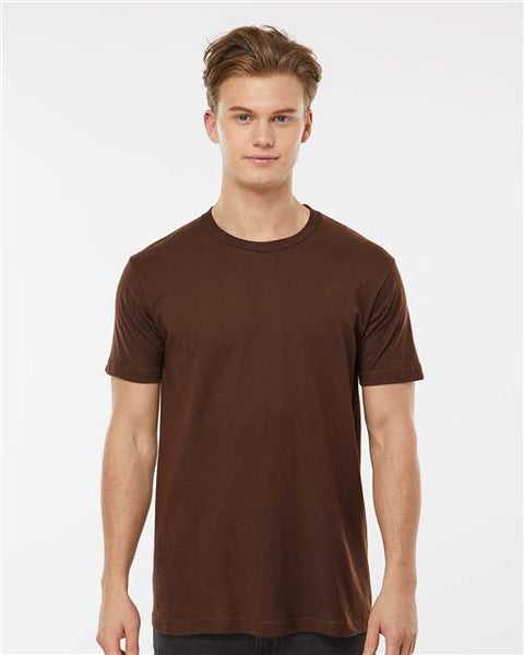 A man wearing a Tultex Unisex Fine Jersey T-Shirt 100% Cotton with double-needle stitching.