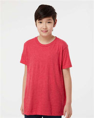 A young boy wearing a Tultex Youth Fine Jersey T-Shirt made of USA cotton, featuring double-needle stitching.